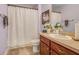 Clean bathroom with shower/tub combo and vanity at 826 Seneca Trl, St Cloud, FL 34772