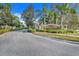 Entrance to the Indian Lakes community with a brick sign at 826 Seneca Trl, St Cloud, FL 34772