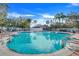 Community pool with surrounding palm trees and brick pavers at 826 Seneca Trl, St Cloud, FL 34772