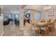 Elegant dining room adjacent to a spacious kitchen at 826 Seneca Trl, St Cloud, FL 34772