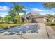 Single-story home with a two-car garage and landscaped yard at 826 Seneca Trl, St Cloud, FL 34772