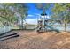 Community playground with playset and lake view at 826 Seneca Trl, St Cloud, FL 34772