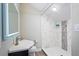 Modern bathroom with a large walk-in shower at 9229 Lake Hickory Nut Dr, Winter Garden, FL 34787