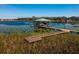 Private boat dock with covered pavilion on peaceful lake at 9229 Lake Hickory Nut Dr, Winter Garden, FL 34787