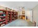 Bright bonus room with extensive built-in bookshelves at 9229 Lake Hickory Nut Dr, Winter Garden, FL 34787