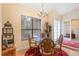 Bright breakfast nook with a glass-top table and four chairs at 9229 Lake Hickory Nut Dr, Winter Garden, FL 34787