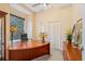 Home office with built-in desk and ample natural light at 9229 Lake Hickory Nut Dr, Winter Garden, FL 34787