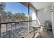 Private balcony with table and chairs at 951 Courtyard Ln # 22, Orlando, FL 32825