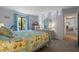 Main bedroom with a king-size bed and dresser at 951 Courtyard Ln # 22, Orlando, FL 32825