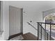 Condo building entry door with access to stairs at 951 Courtyard Ln # 22, Orlando, FL 32825