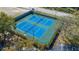 Two well-maintained tennis courts at 951 Courtyard Ln # 22, Orlando, FL 32825