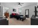 Comfortable bedroom features a large mirror and a decorative black bench at the foot of the bed at 958 Anna Pl, Davenport, FL 33837