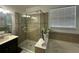 Bathroom with soaking tub and shower at 3020 Cardillino Way, Kissimmee, FL 34741