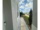 Sidewalk with stone pathway next to house at 3020 Cardillino Way, Kissimmee, FL 34741