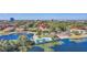 Beautiful aerial view of community pool, lake, and lush landscaping at this lovely condo community at 1000 Winderley Pl # 143, Maitland, FL 32751