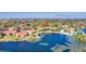 Aerial view showcases the community homes and proximity to the lake at 1000 Winderley Pl # 143, Maitland, FL 32751