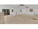 Spacious living room with beautiful tile floors, natural light, and an open floor plan at 1000 Winderley Pl # 143, Maitland, FL 32751