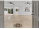 Spacious living room with tile floors, ceiling fans, an open layout with views to other rooms at 1000 Winderley Pl # 143, Maitland, FL 32751