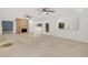 Bright living room featuring tile floors, a stone fireplace, and an open design at 1000 Winderley Pl # 143, Maitland, FL 32751