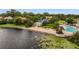 Water view of a community pool, lounge area and lake showcasing recreational amenities and natural beauty at 1000 Winderley Pl # 143, Maitland, FL 32751