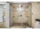 Walk-in shower with tiled walls, and a glass enclosure at 1000 Winderley Pl # 143, Maitland, FL 32751