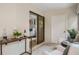 Relaxing sunroom with comfortable seating, a bar area, and access to the bedroom at 1000 Winderley Pl # 143, Maitland, FL 32751