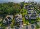 Aerial view of a luxury home with pool on a large lot backing up to a lake at 10219 Atwater Bay Dr, Winter Garden, FL 34787