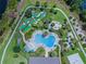 Aerial view of resort-style pool, mini golf, and lounging areas at 10219 Atwater Bay Dr, Winter Garden, FL 34787