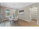 Cozy dining room features modern lighting, ample natural light, and views of the outdoors at 10219 Atwater Bay Dr, Winter Garden, FL 34787