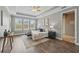 Spacious main bedroom boasts a tray ceiling, large windows, and a serene atmosphere at 10219 Atwater Bay Dr, Winter Garden, FL 34787