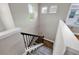 Upstairs hallway with view of another staircase at 10219 Atwater Bay Dr, Winter Garden, FL 34787