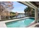 Sparkling pool with scenic lake views at 10380 Kensington Shore Dr, Orlando, FL 32827