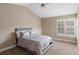Bright bedroom with carpeted floor and a ceiling fan at 110 Becket Ln, Lake Mary, FL 32746