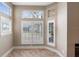 Bright breakfast nook with multiple windows and plantation shutters at 110 Becket Ln, Lake Mary, FL 32746