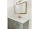 Bathroom with a vanity with a marble countertop and gold fixtures at 1120 Portland Ave # 4, Orlando, FL 32803