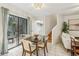 Bright dining area with sliding glass doors leading to patio at 1120 Portland Ave # 4, Orlando, FL 32803