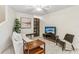 Living room with a sofa, shelving, and a large TV at 1120 Portland Ave # 4, Orlando, FL 32803