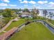 Expansive waterfront property with a luxurious home, boat house, lush lawns, and a private canal at 11900 Lake Butler Blvd, Windermere, FL 34786
