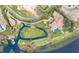 Breathtaking aerial view of a grand estate featuring a private lake, lush landscaping, and a pool at 11900 Lake Butler Blvd, Windermere, FL 34786