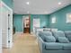 Expansive bonus room with a seating area, stylish island, and easy access to other parts of the house at 11900 Lake Butler Blvd, Windermere, FL 34786
