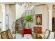 Grand entryway features a spiral staircase with custom ironwork and luxury finishes at 11900 Lake Butler Blvd, Windermere, FL 34786