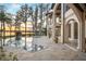 Stunning home with a custom pool, mature landscaping and water views at 11900 Lake Butler Blvd, Windermere, FL 34786