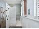 This shower has tile walls, pebble flooring, and dual shower heads at 11900 Lake Butler Blvd, Windermere, FL 34786