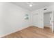 Well-lit bedroom with wood floors and closet at 120 Anderson Cir, Sanford, FL 32771