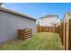 Private backyard with wooden fence and grassy area at 13415 Laxness St, Orlando, FL 32827