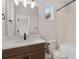 Bathroom with a single vanity and a tub shower combo at 13415 Laxness St, Orlando, FL 32827