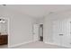Bedroom with double door closet and access to a bathroom at 13415 Laxness St, Orlando, FL 32827