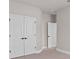 Large bedroom closet with double doors at 13415 Laxness St, Orlando, FL 32827