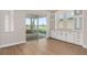Bright dining area with sliding glass doors and built-in cabinetry at 13415 Laxness St, Orlando, FL 32827