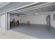 Spacious two-car garage with epoxy flooring at 13415 Laxness St, Orlando, FL 32827